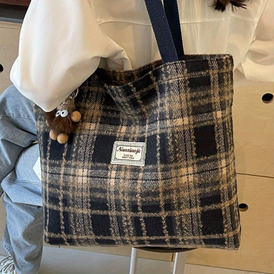 One Women'S Spacious Plaid Shoulder Bag Made of Tweed Fabric, Featuring a Zipper Closure, an Adjustable Shoulder Strap, And Lining. Available in Red, Black, And Blue Plaid Designs, It Is Machine Washable And Perfect for Work, Daily Use