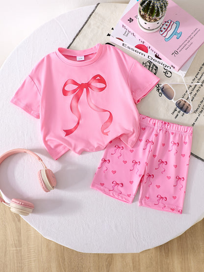 2pcs Set of Casual Loose-fitting Round-neck Short-sleeve T-shirt and Shorts for Girls Aged 1-6, Featuring Cute Heart and Bowknot Prints, Suitable for Daily Wear, Outings, Home, and School in Spring and Summer, Perfect for Outdoor