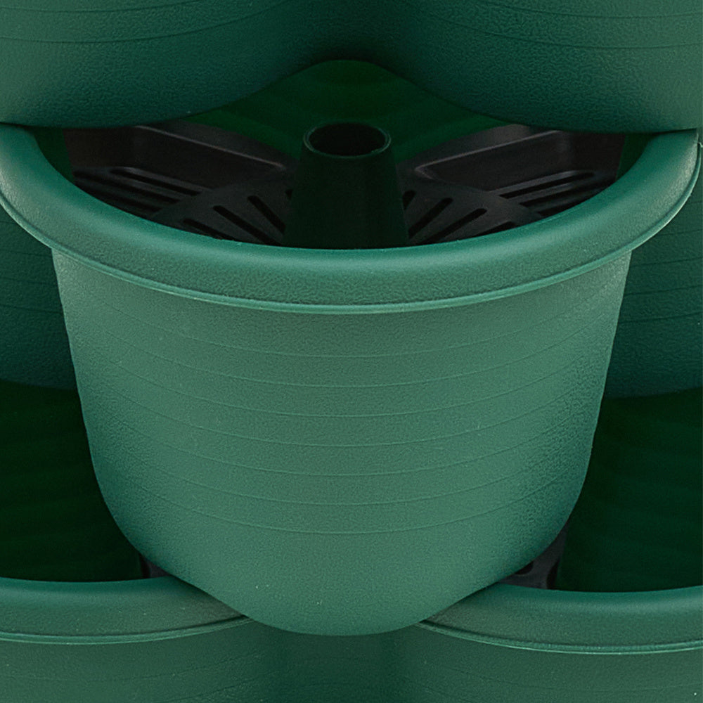 The three-dimensional three-petal flowerpot, strawberry pot, can be multi-layered for vegetable and fruit planting. It is made of pp plastic with five layers, black/ white/ green, and measures 31.5*31.5**13.5cm