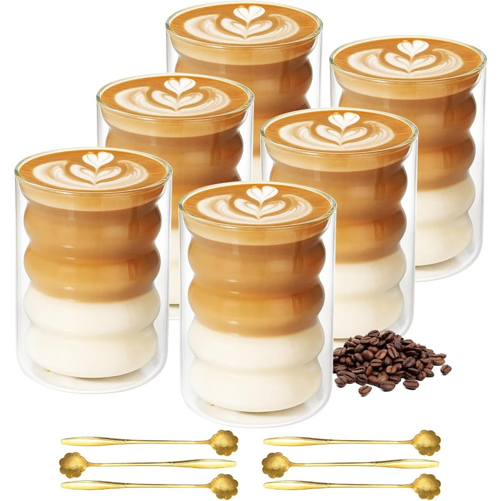 This 6-pack of double, walled glass coffee cups, each with a 330ml (11oz) capacity, keeps drinks hot or cold. Includes 6 spoons and is dishwasher safe. Perfect for serving tea, cappuccino, and latte at home, in a cafe, or in the office.