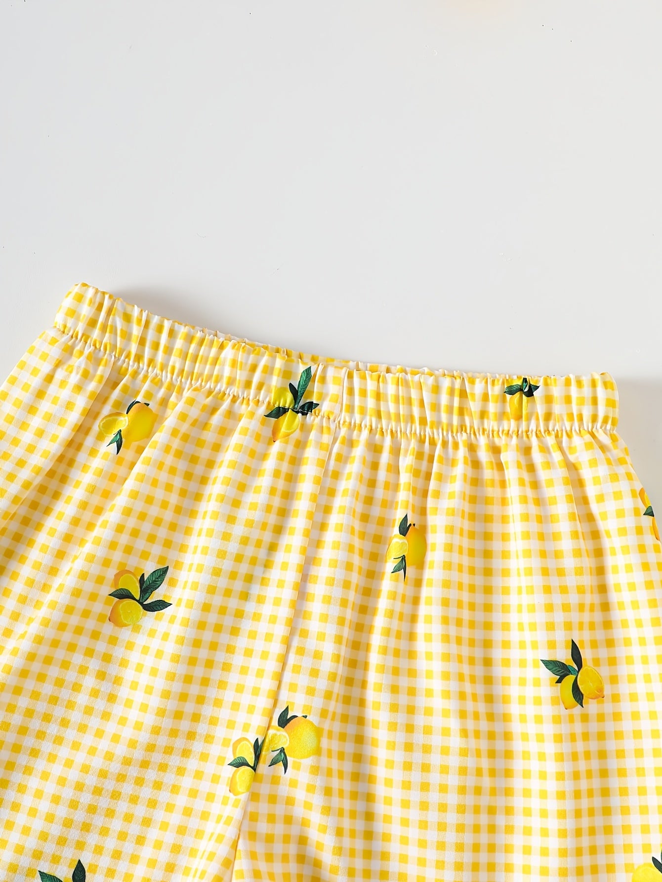 2pcs Set. Girls' Vest And Shorts Outfit, Lemon Print, Contrast Plaid Pattern, Bow Detail, Ruffled Hem. Summer Casual Outfit for Girls. Ideal Gift for 1-8 Year Olds. Suitable for Outdoor Wear