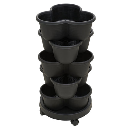 The three-dimensional three-petal flowerpot, strawberry pot, can be multi-layered for vegetable and fruit planting. It is made of pp plastic with five layers, black/ white/ green, and measures 31.5*31.5**13.5cm
