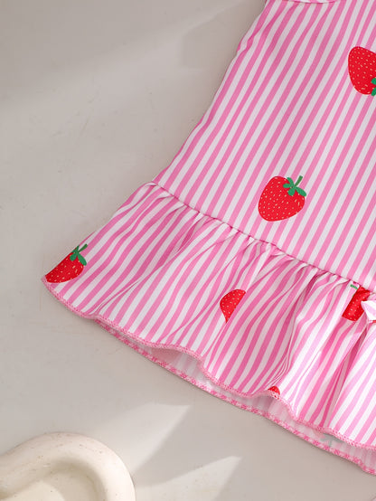 A Two-Piece Set. A Tank Top And Shorts Outfit Featuring Strawberry Prints, Striped Patterns, Bow Decorations, And a Ruffled Hem Design. This Is a Casual Summer Outfit for Girls. It Makes a Great Gift for Girls' Clothing. Suitable for Outdoor Wear