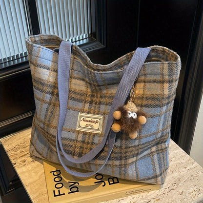 One Women'S Spacious Plaid Shoulder Bag Made of Tweed Fabric, Featuring a Zipper Closure, an Adjustable Shoulder Strap, And Lining. Available in Red, Black, And Blue Plaid Designs, It Is Machine Washable And Perfect for Work, Daily Use