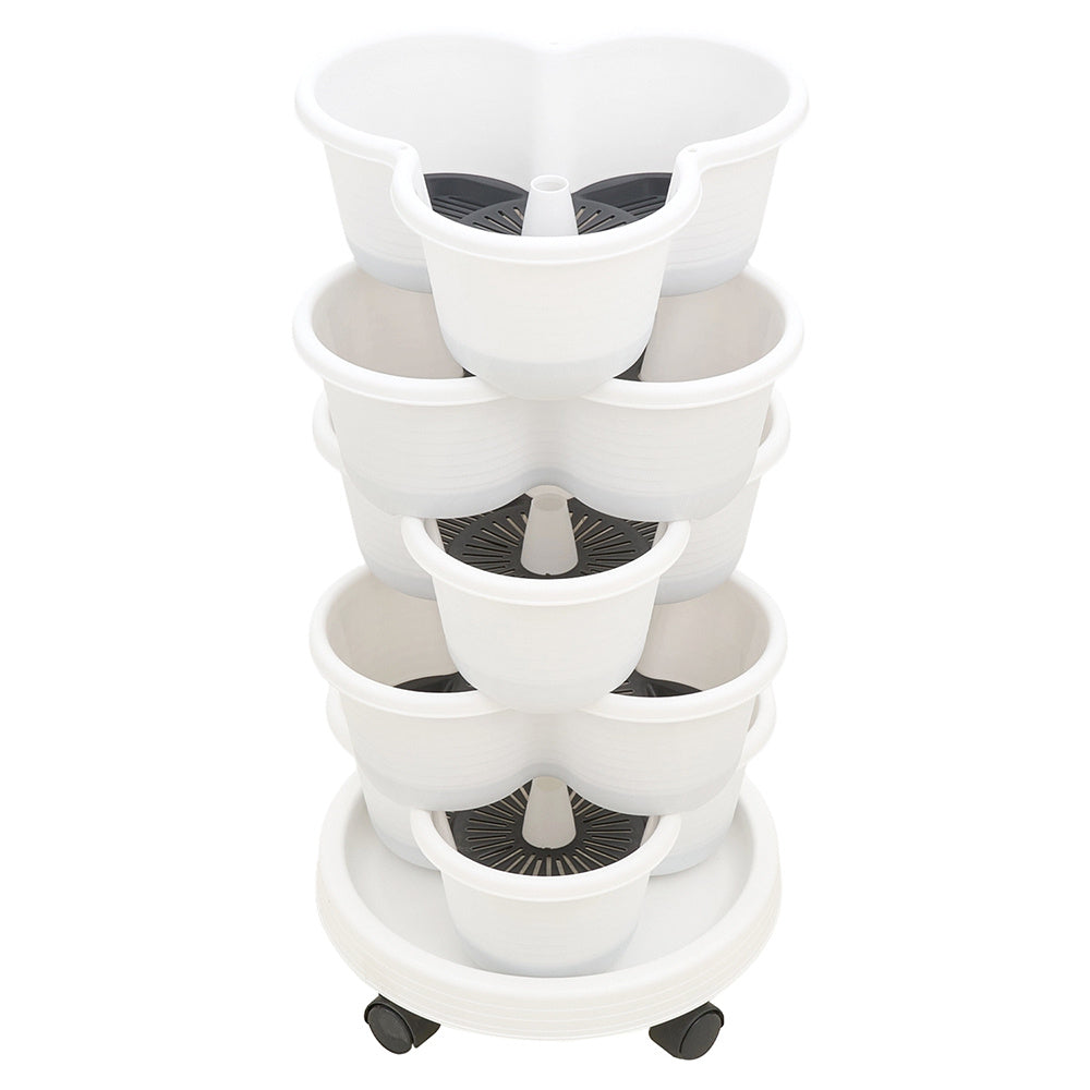 The three-dimensional three-petal flowerpot, strawberry pot, can be multi-layered for vegetable and fruit planting. It is made of pp plastic with five layers, black/ white/ green, and measures 31.5*31.5**13.5cm